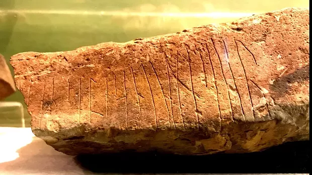 "... Are in heaven, hallowed be ..." reads this runic fragment from the Lord's Prayer, on a stone found near Ophir, Orkney. It's now in the Kirkwall Museum. - PHOTO BY BARRY EVANS