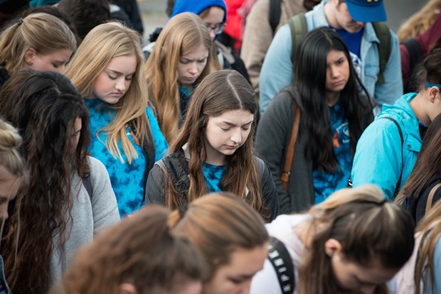 Fortuna High School students pause for a moment of silence. - MARK MCKENNA