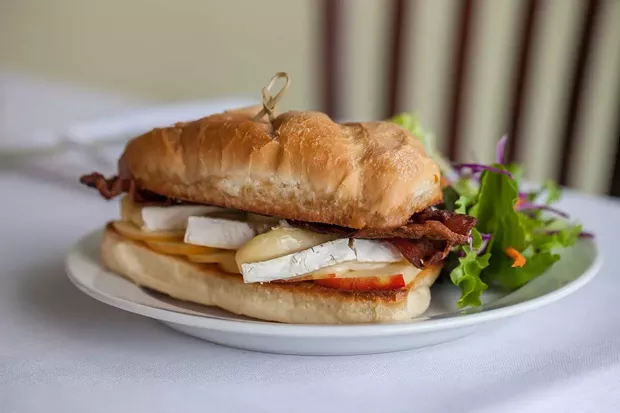 Grilled brie with bacon and apples. - PHOTO BY AMY KUMLER. STYLING BY LYNN LEISHMAN.