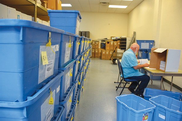 Boxes of ballots wait to be processed and counted at the Humboldt County Elections Office in 2018.