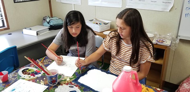 Two students &mdash; Haylee (left) and TeMaia &mdash; doing an art project in the Del Norte Indian Education Center After School Program at Crescent Elk Middle School.