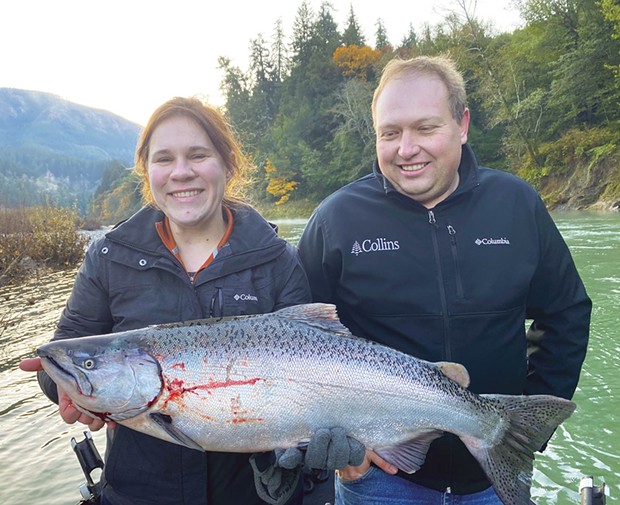 Minda Lawrence and Grant Vallier, of Lakeview, Oregon, hold one of the two kings they caught to limit out Saturday on the Chetco River while fishing with guide Michael McGahan of Wild Rivers Fishing.