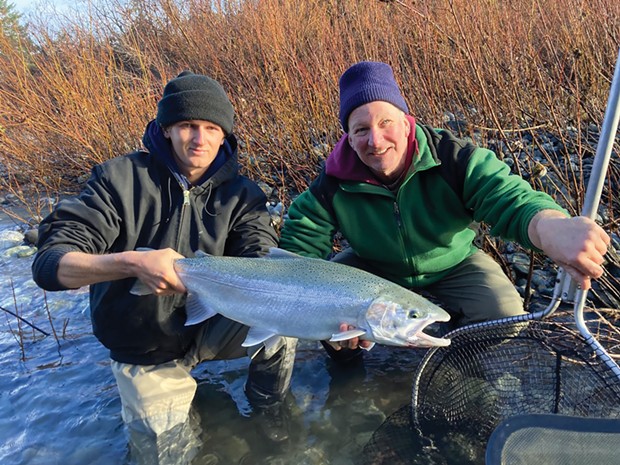 Jim Rawson right, and Fisher Baxter joined forces to catch and release this beautiful wild steelhead on a recent outing to the Smith River.
