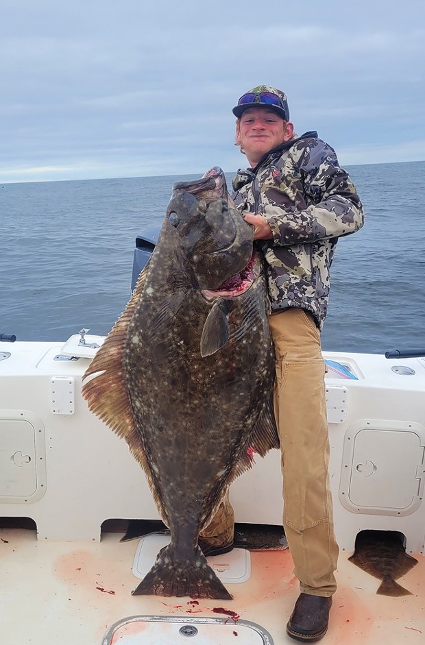 Fortuna resident Austin Scilacci landed this monster 80-pound Pacific halibut Sunday while fishing out of Eureka with Marc Schmidt of Coastline Charters.