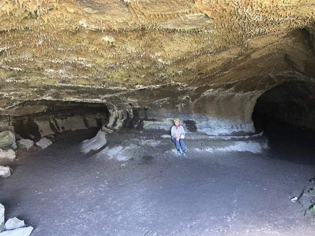The spacious entrance chamber of Valentine Cave in Lava Beds National Monument. Its jagged lava floor was covered with pumice in the 1930s.