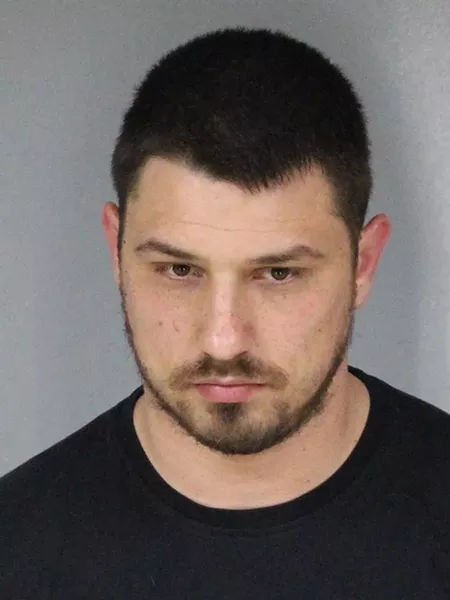 Mug shot of Evgeni Kopankov, one of the three men accused in the heist plot. - SUBMITTED