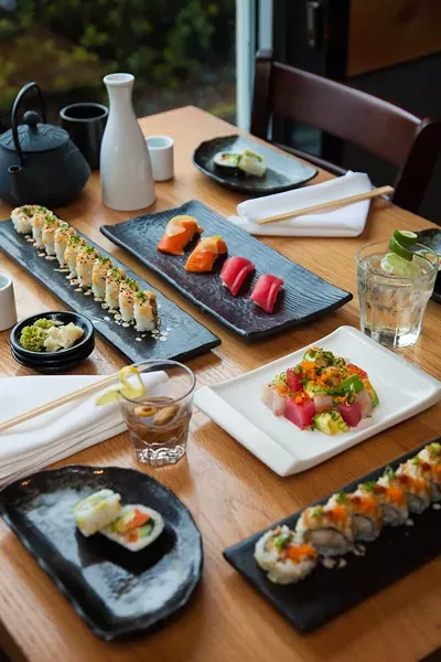 Clockwise from upper left: Klamath Roll, nigiri sushi, Tokyo Mule, butsugiri, the Kani Crunch Roll, Vegetarian Rolls, the Full Moon oyster shooter. - PHOTO BY AMY KUMLER. STYLING BY LYNN LEISHMAN.