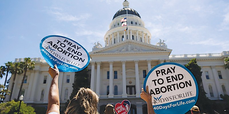 Anti-abortion protesters gathered at the state Capitol against abortion measures before the Legislature on June 22, 2022.