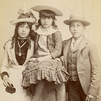 A portrait of Josephine, Christina and Joseph Allard, three students who were members of the Snohomish Tribe and attended Chemawa Indian School in Salem, Oregon, circa 1889.