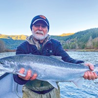 Jeff Bounsall, of Napa, holds a steelhead caught Jan. 23 on the Chetco River while fishing with guide Andy Martin of Wild Rivers Fishing.