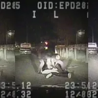 Still frames from a Dec. 6, 2012 Eureka police video.
