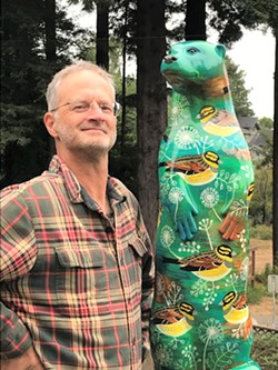 Jeff Black with a piece of otter art. - Uploaded by sueleskiw