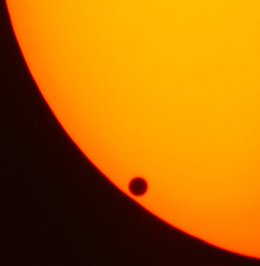Venus just after "second contact," beginning its June 8, 2004 transit across the face of the sun. - JAN HEROLD, WIKIMEDIA COMMONS