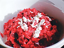 Vibrant Red Beet Risotto topped with Cypress Grove Chevre. Photo by Simona Carini