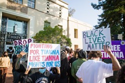 COURT PROCESS Supporters stood in solidarity outside the SLO County Courthouse for local activist and protest leader Tianna Arata's first virtual court hearing on Sept. 3, but were not present for her Sept. 17 hearing. - FILE PHOTO BY JAYSON MELLOM