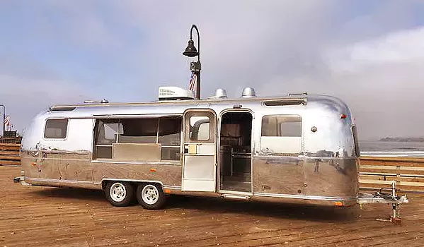 SUNSETS AT THE PIER One of three vintage Airstreams purchased by the city of Pismo Beach will be used as Rib Line's newest location, a food truck serving street food, beer, and wine right on the Pismo pier. - PHOTO COURTESY OF THE CITY OF PISMO BEACH