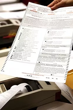 SIGNING BALLOTS While some voters are already receiving alerts that their ballots have signature match problems, the SLO County clerk-recorder said not to worry yet. - FILE PHOTO