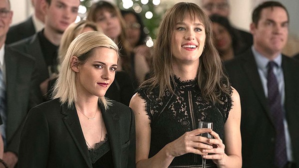 HOMECOMING OUT When Abby (Kristen Stewart, left) agrees to join her girlfriend, Harper (Mackenzie Davis), at her family's home for the holidays, she soon discovers Harper has been harboring a secret that threatens their otherwise solid relationship, in Happiest Season, screening on Hulu. - PHOTO COURTESY OF TRISTAR PICTURES