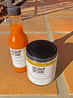 FERMENTED GOODS Colony Culture, owned by Erik Knapp's sister, Monika, is selling hot sauce, mustard, and more alongside Colony Mash beers. - PHOTO BY CAMILLIA LANHAM