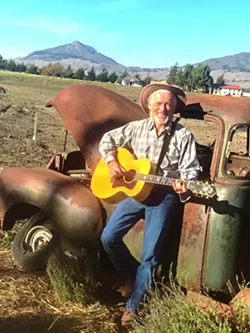 SONG OF THE TIMES Local singer-songwriter Ted Waterhouse re-releases "Woody's Ghost," a song about Woody Guthrie's political musical commentary of America. - PHOTO COURTESY OF CHERI MASON