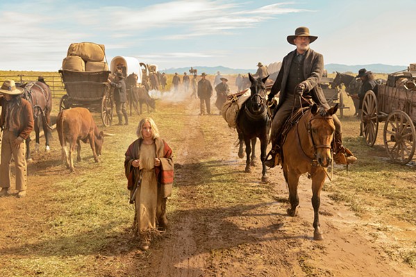 ON THE ROAD Kidnaped by the Kiowa as a small child, Johanna (Helena Zengel) is being escorted home to the white family she doesn't remember by Civil War veteran Capt. Jefferson Kyle Kidd (Tom Hanks), in the episodic Western News of the World, screening on demand. - PHOTO COURTESY OF UNIVERSAL PICTURES