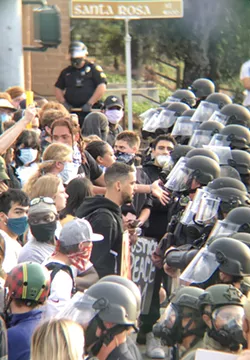 EIGHT MONTHS LATER The city of San Luis Obispo is still grappling with the events of June 1, 2020, when protesters and police squared off on Santa Rosa Street and police eventually used teargas to disperse demonstrators. - FILE PHOTO BY PETER JOHNSON