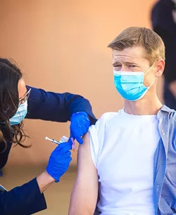 CHANGE-UP As SLO County rolls out a new lottery system to schedule COVID-19 vaccinations, it's also preparing to transition to the state's flawed and glitchy MyTurn portal. - FILE PHOTO BY JAYSON MELLOM