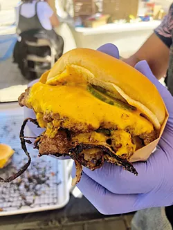 ORDER UP David Jang's love of food translated to creating a pop-up serving smash burgers to help a local business. - PHOTO COURTESY OF HOT MEAT SOCIETY