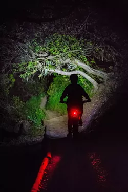 CEMENTED INTO LAW A divided SLO City Council passed an ordinance on Nov. 9 that makes permanent a three-year pilot program allowing night hiking on Cerro San Luis in the winter season. - FILE PHOTO BY JAYSON MELLOM