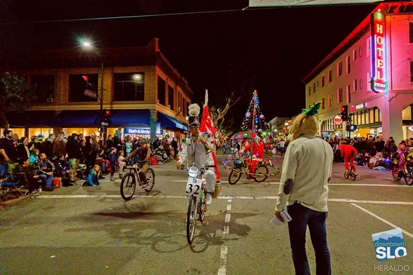 HOLIDAY SPIRIT The SLO Holiday Parade (pictured) returns on Dec. 3—with a few changes—after being canceled last year due to COVID-19. - PHOTO COURTESY OF STEPHEN HERALDO FOR DOWNTOWN SLO