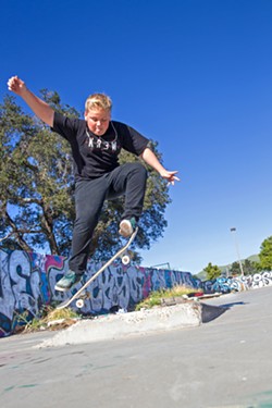 REMEMBERING HOME In 2017 Cody Barrackman skates at "the Rec," a makeshift skate park that no longer exists at the site of Nipomo's old recreation center, which was destroyed by arson in 2008. - FILE PHOTO BY JAYSON MELLOM