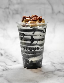 TV INSPIRED Sequel's Squid Game drink is a fan favorite, inspired by the popular Netflix series. It features cold-brewed oolong tea, organic Humboldt Creamery milk, cloud cream, a shot of activated charcoal, Dalgona coffee cream, and is topped with Dalgona candy crumble. - PHOTOS COURTESY OF SEQUEL COLD BREW TEA