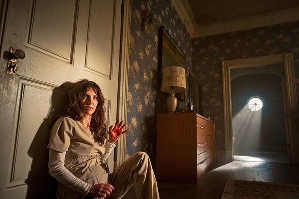 WHERE IS MY MIND? After having a dream about a violent intruder entering her home, Madison Lake (Annabelle Wallis) wakes up to find her abusive husband murdered, in director James Wan's trippy thriller, Malignant. - PHOTO COURTESY OF NEW LINE CINEMA