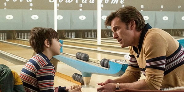 LOOKING FOR GUIDANCE Young and fatherless J.R. (Daniel Ranieri, left) learns to be a man from his bartender uncle, Charlie (Ben Affleck), in The Tender Bar, based on J.R. Moehringer's 2005 memoir. - PHOTO COURTESY OF BIG INDIE PICTURES AND SMOKEHOUSE PICTURES