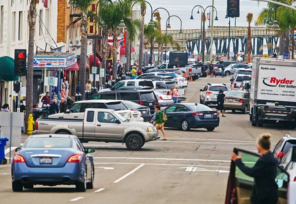 PRICEY PARKLET What used to be parking spaces in downtown Pismo Beach are now parklets, which the city is talking about making permanent and charging $580 per parking space. - FILE PHOTO BY JAYSON MELLOM