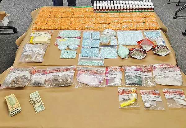 DANGEROUSLY LARGE Assistant District Attorney Eric Dobroth said that the quantity of recently seized narcotics is the largest he's come across in his 16-year tenure in SLO County. - PHOTO FROM SAN LUIS OBISPO CITY NEWS