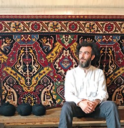 MAGIC CARPET RIDE Azerbaijani contemporary artist Faig Ahmed, 40, creates surrealist weavings into traditional Persian rugs. A collection of his work is on display at the San Luis Obispo Museum of Art through May 15. - PHOTO COURTESY OF FAIG AHMED