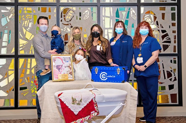 DONATION Ashley Agnitch and her family stand with Marian's Cuddle Cot and Marian Regional Medical Center Family Birthing Center representatives. - PHOTO COURTESY OF DIGNITY HEALTH
