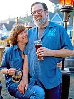 SMALL BUT MIGHTY Aaron and Jennifer Wharton are proud of 927, the smallest continually running brewery in the county. They only use three barrels but estimate their beer donations have helped to raise more than $50,000 for local charitable causes. - COURTESY PHOTO BY MARK DEKTOR PHOTOGRAPHY