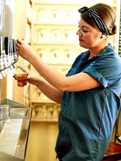 PATIENCE ON TAP Ashley McKinney is 927's "bartender extraordinaire," according to owner Aaron Wharton. She's an ace worker and "always graciously puts up with us," adds regular customer Dixie Walker. - COURTESY PHOTO BY MARK DEKTOR PHOTOGRAPHY