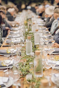 UP CLOSE AND PERSONAL Table and Vine’s three-hour culinary journey—guided by guest chefs and vintners—features an intimate communal setting for approximately 50 guests. - COURTESY PHOTO BY HUGO MARTINEZ/HM IMAGERY