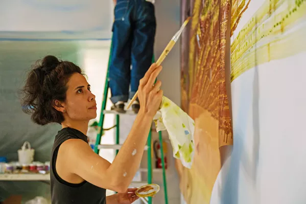 PAINT A trained painter, Camille Hoffman also uses collage, mixed media, and non-traditional material in her work at SLOMA. - PHOTO COURTESY OF HERALDO CREATIVE STUDIO