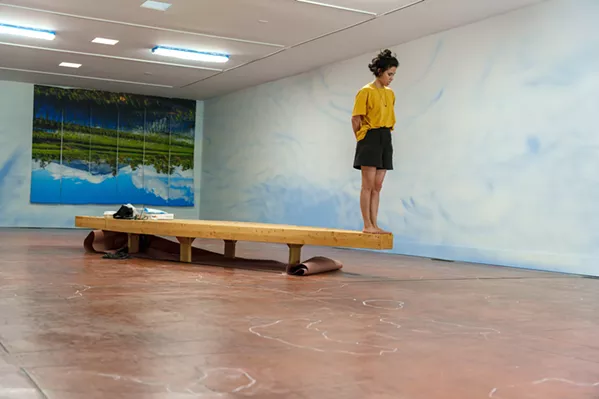 INSTALLATION A boat-shaped bench occupies Camille Hoffman's installation in the Gray Wing of the SLOMA, a nod to Filipino seafaring traditions. - PHOTO COURTESY OF HERALDO CREATIVE STUDIO