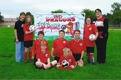 GO RED DRAGONS! : This soccer team of special needs kids learned some valuable lessons—and taught some too—playing in the Atascadero Youth Soccer Association last season. - PHOTO COURTESY OF THE RED DRAGONS