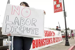 PROTEST WARS : After about two months of protests from the Carpenters Local 150, community members and employees of Doc Burnstein’s Ice Cream Lab in Arroyo Grande fired back. Adrienne Garcia, pictured left, emphasizes that there’s no dispute. - PHOTO BY STEVE E. MILLER