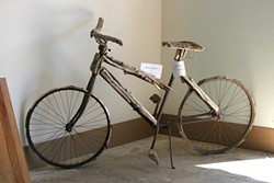 DON&rsquo;T TOUCH! :  This bike with driftwood additions is one of the few things in the gallery too delicate to touch. - PHOTO BY GLEN STARKEY