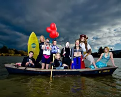 ALL IN THE SAME BOAT : (l-r) Daniel Salas (musician), Shelley Malcolm (surfer), Sarah Worrell (tourist), Courtney Rucker (cheerleader), Christy Heron (‘50s housewife) Amy Asman (mime), Adaire Hahn (belly dancer), Ryan Miller (pirate), and Heather Weltner (mermaid). Art director: Ashley Schwellenbach. Hair and makeup by Shelby Hood. Boat (the Mudhen) courtesy of Glen Starkey. - PHOTO BY STEVE E. MILLER