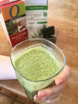 JUICE IT: Sarah uses juice from medical marijuana leaves that are high in cannabidiol (CBD), the highly medicinal and non-psychoactive compound in marijuana, to treat rheumatoid arthritis. She juices large batches at a time, freezes them, and then drinks it every morning with almond milk and hemp protein, which binds together with the CBD and increases the medicinal impact on the body. - PHOTO COURTESY OF SARAH