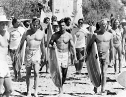 MAKING WAVES: This year’s Spotlight Award honors John Milius, the director of the surf film classic, 'Big Wednesday,' starring Jan-Michael Vincent, William Katt, and Gary Busey. - PHOTO COURTESY OF SLOIFF