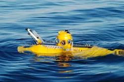THIRD TIME DOWN : Task-force guide Robert Schwemmer, peering from an observation port of the Delta submersible on a dive to the wreck years ago, will soon learn whether the Montebello has since significantly deteriorated. - PHOTO BY TASK FORCE